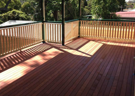 Hardwood deck with timber railing in Old Louisville