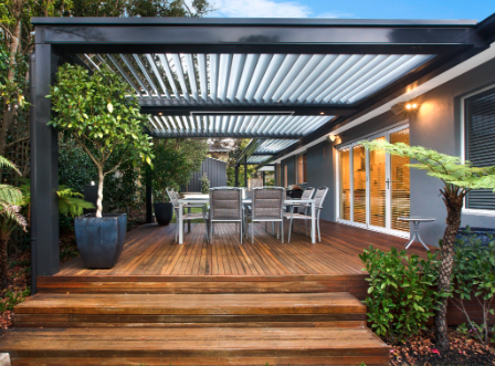 Modern deck with louvered pergola in Germantown, Louisville